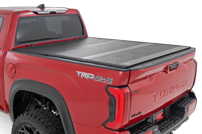 Rough Country Hard Low Profile Bed Cover for Toyota Tundra 22-26 with 5'7" Bed — installed at Road Runner Wheels & Tires · primary view