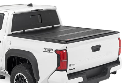 Rough Country Hard Low Profile Bed Cover for Toyota Tacoma 2024-2026 — installed at Road Runner Wheels & Tires · primary view