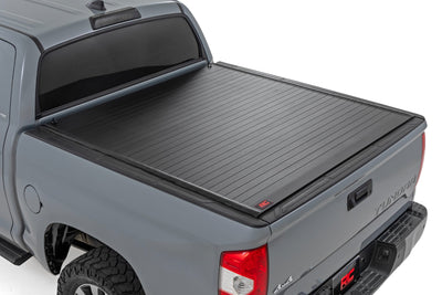 Rough Country Hard Roll Up Bed Cover for Toyota Tundra 2007-2021 with 5'7" Bed — installed at Road Runner Wheels & Tires · primary view