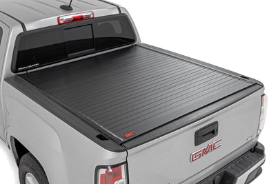 Rough Country Hard Roll Up Bed Cover for Chevy/Gmc with 5' Bed — installed at Road Runner Wheels & Tires · primary view