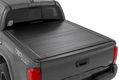 Rough Country Hard Roll Up Bed Cover for Toyota Tacoma 2016-2023 with 5' Bed — installed at Road Runner Wheels & Tires · primary view