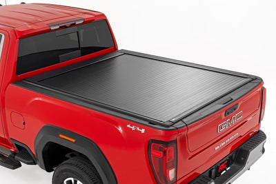 Rough Country Powered Retractable Bed Cover for Chevy/Gmc with 6'9" Bed — installed at Road Runner Wheels & Tires · primary view