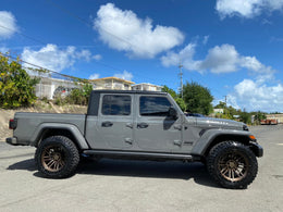 rrwvimg::https://axedealer.com/wp-content/uploads/2023/07/Jeep-icarus-bronze.jpg