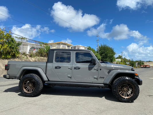 rrwvimg::https://axedealer.com/wp-content/uploads/2023/07/Jeep-icarus-bronze.jpg