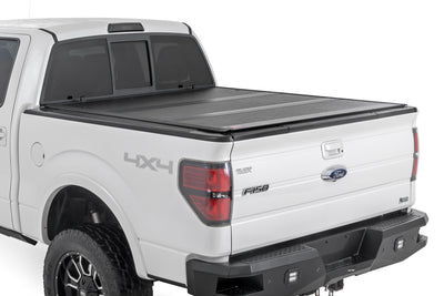 Rough Country Hard Low Profile Bed Cover for Ford F-150 2004-2014 — installed at Road Runner Wheels & Tires · primary view