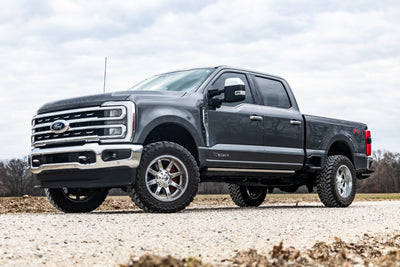 2 Inch Leveling Kit | Track Bar Bracket | Ford F-250/F-350 Super Duty (17-26) - Rough Country at Road Runner Wheels & Tires